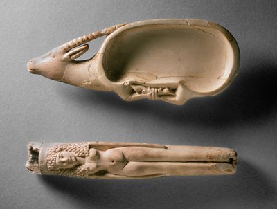 Kohl tube in the form of a nude female and cosmetic dish in the form of an ibex with bound legs, from Tomb 562, Qau by Egyptian 19th Dynasty